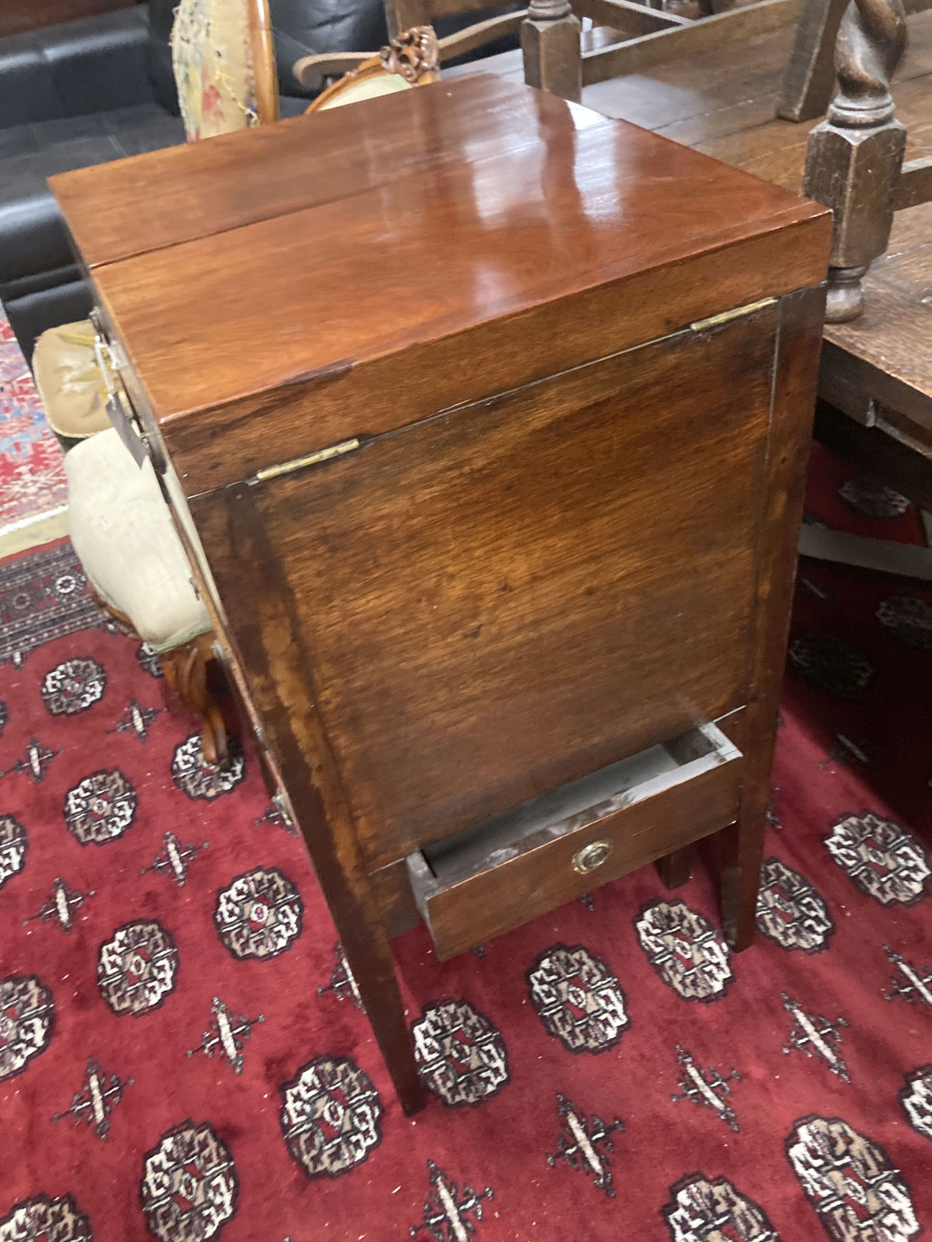 A George III mahogany tambour front enclosed washstand, width 53cm, depth 45cm, height 87cm